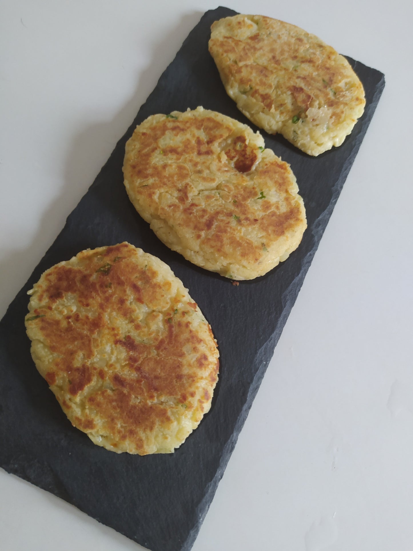 Potato cakes stuffed with cheese